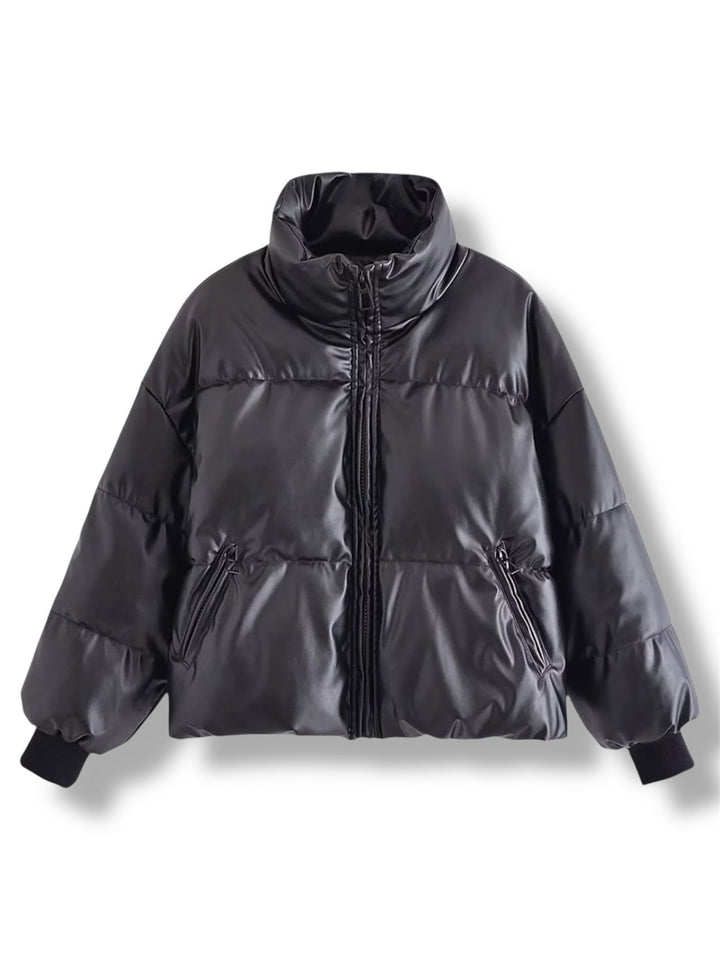 Black puffer jacket on a white background