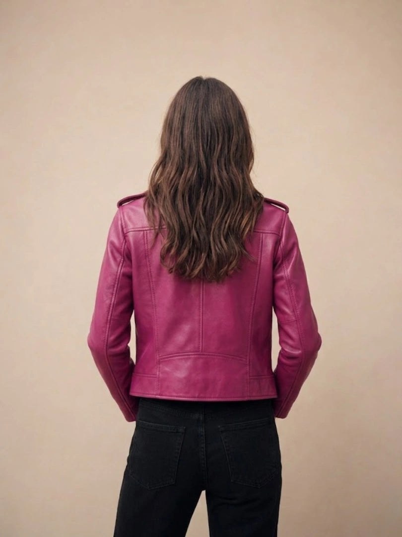 Person wearing a pink leather jacket from behind on a beige background