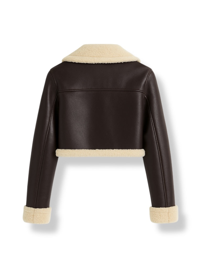 back of the brown crop shearling leather jacket with beige trim on a white background