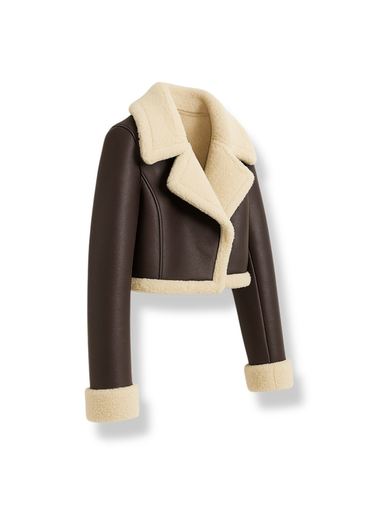 side view of Brown shearling crop leather jacket with beige shearling collar and cuffs on a white background