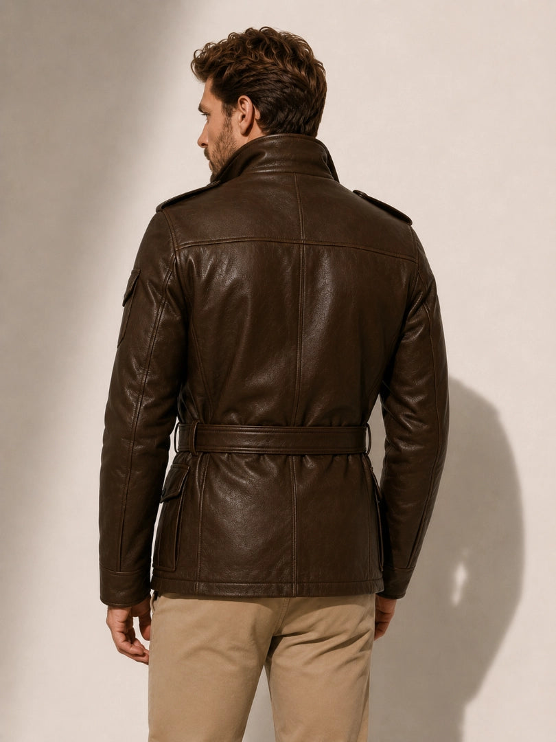 Man wearing a brown leather jacket against a plain background