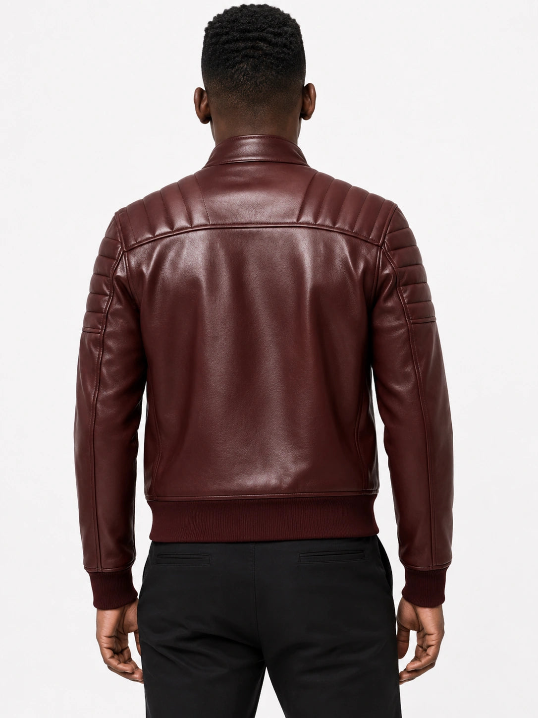 Man wearing a brown leather jacket on a white background