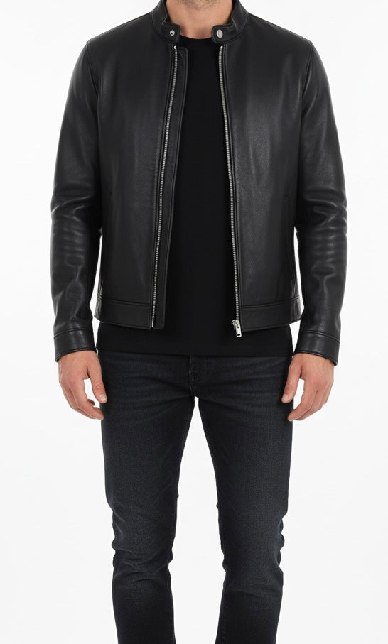Black leather jacket worn by a person on a white background